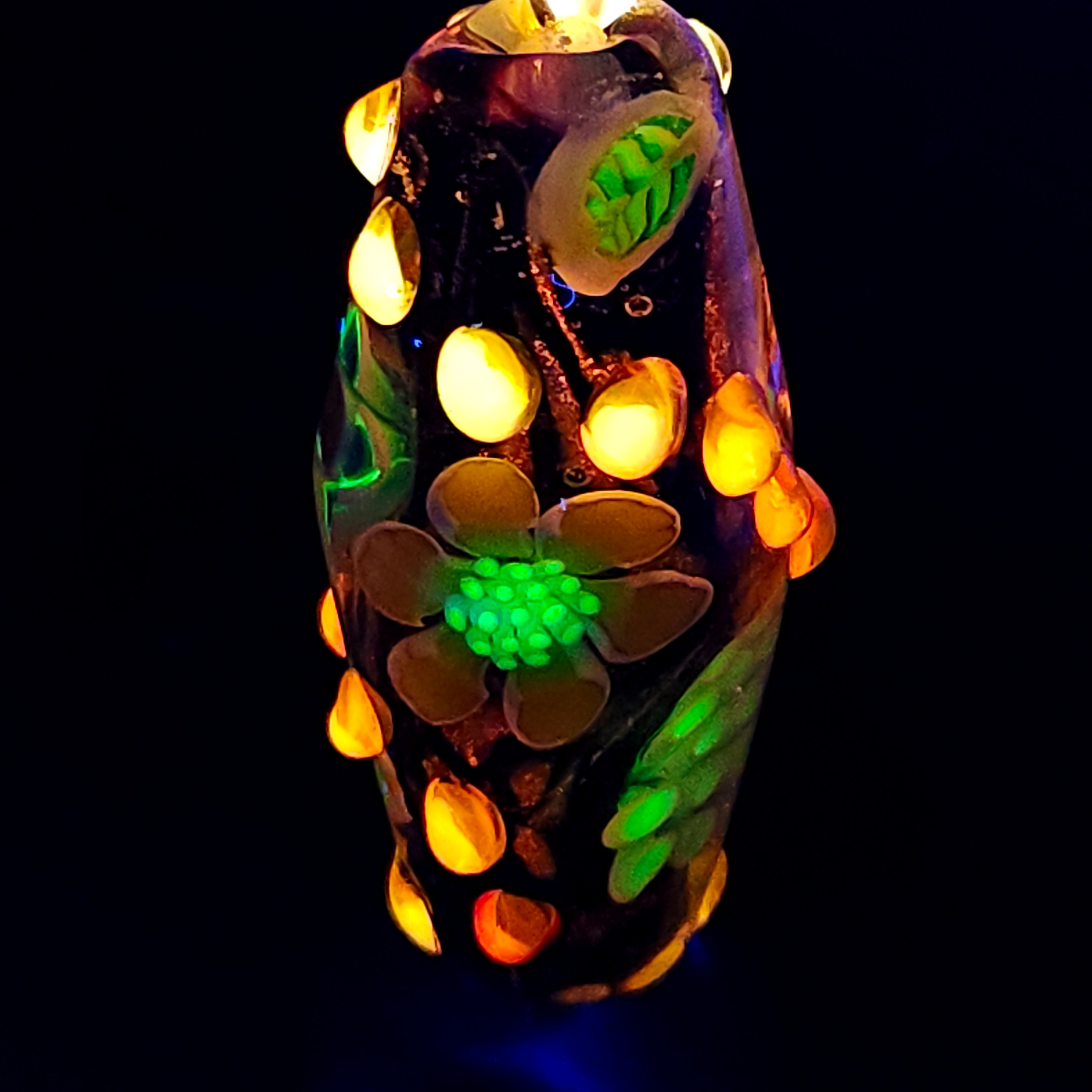 Bi-cone flower murrine bead, with Uranium and Cadmium UV fluorescence