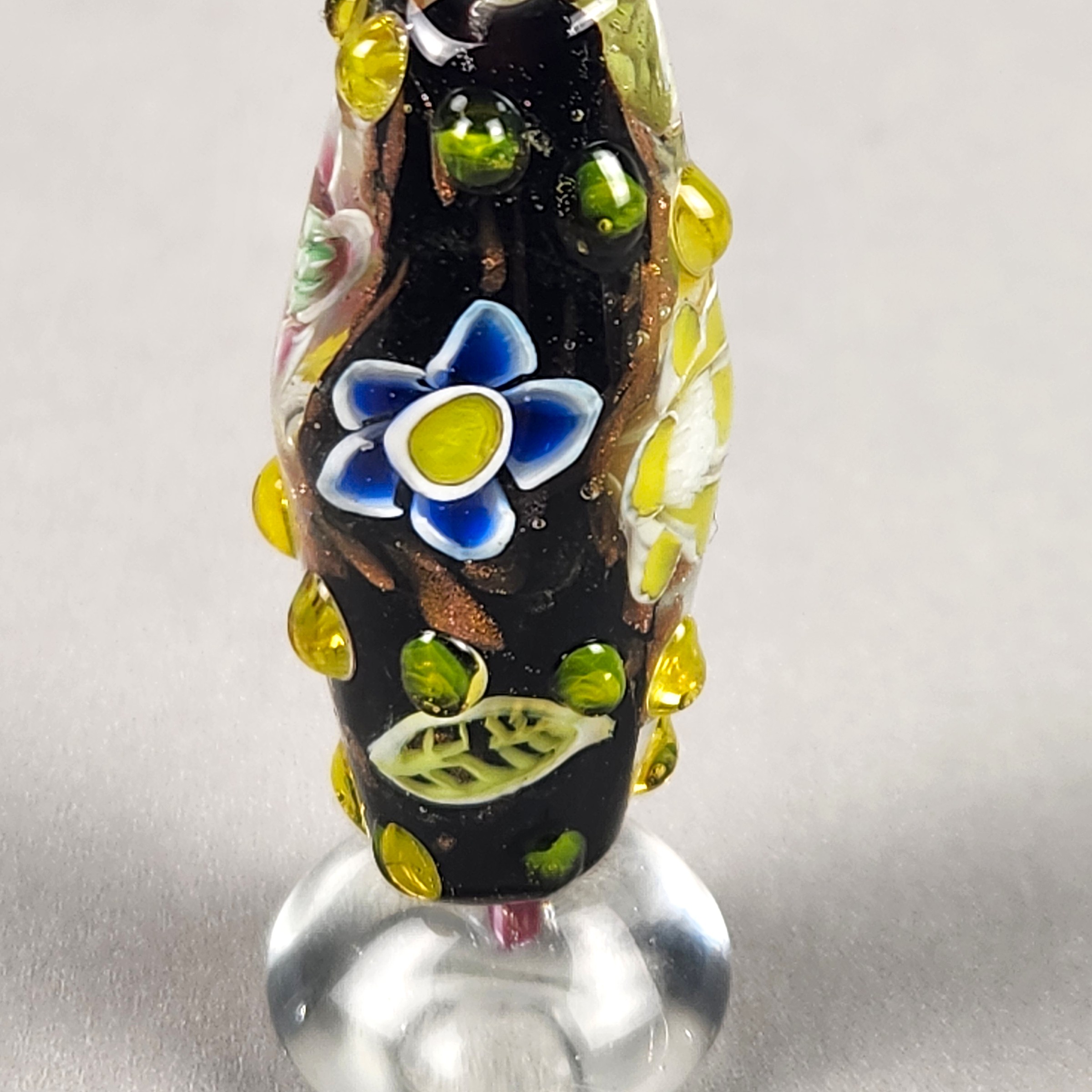 Bi-cone flower murrine bead, with Uranium and Cadmium UV fluorescence