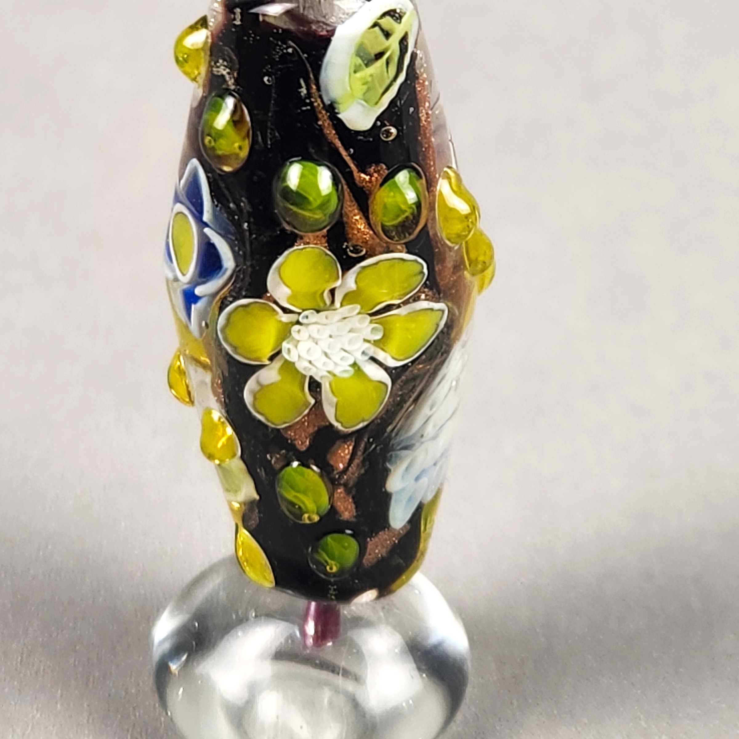 Bi-cone flower murrine bead, with Uranium and Cadmium UV fluorescence