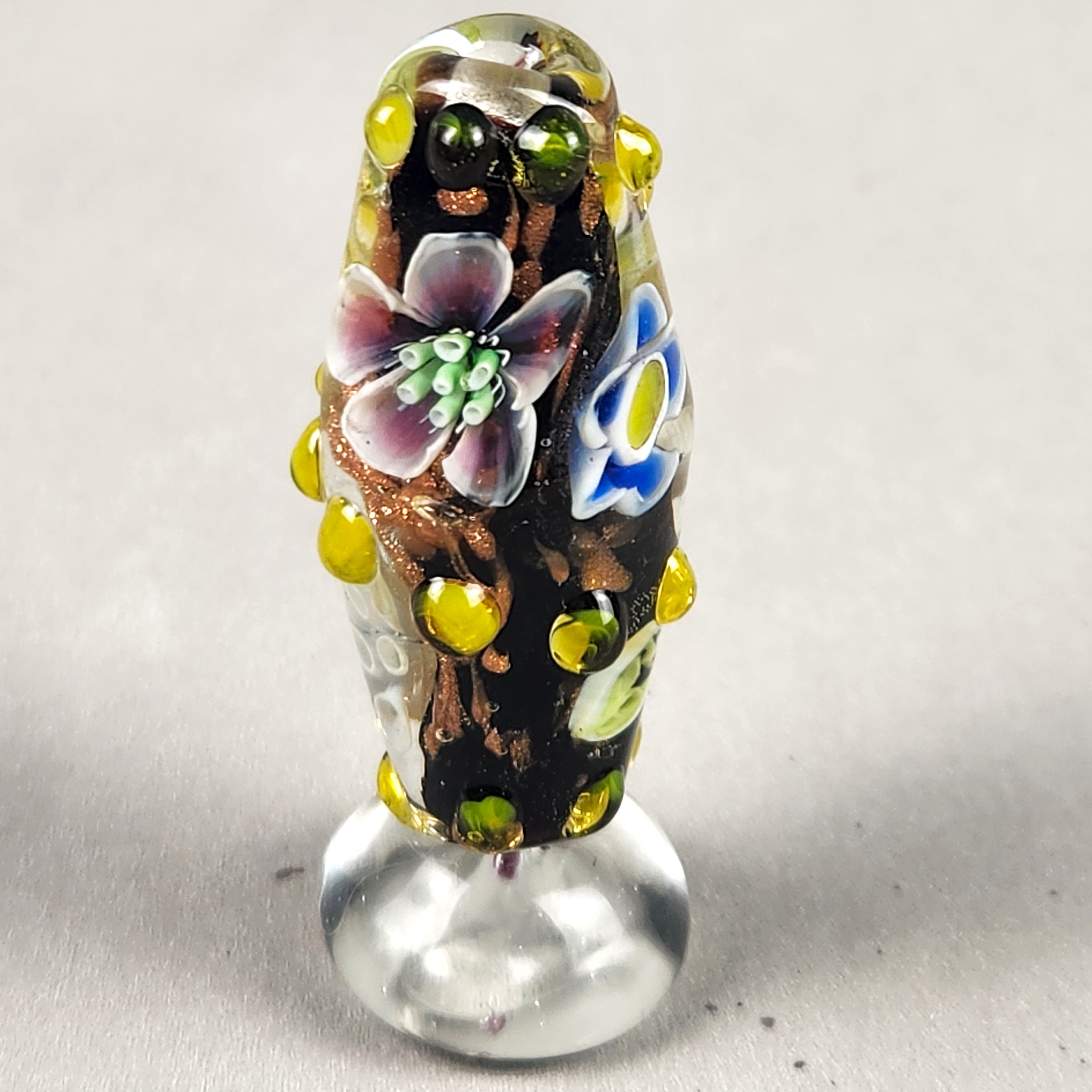 Bi-cone flower murrine bead, with Uranium and Cadmium UV fluorescence