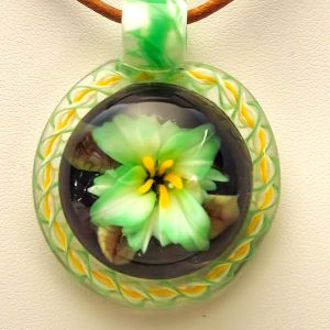 Emerald lily pendant