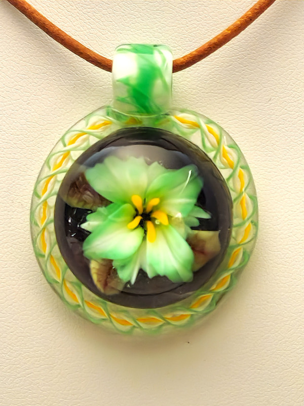 Emerald lily pendant